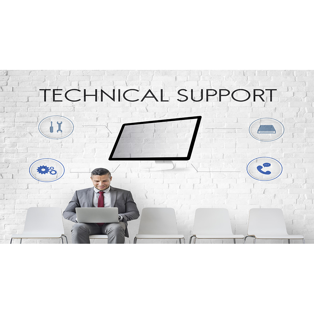 A woman conducting a mock interview with a man, both seated at a table with documents and a water bottle.